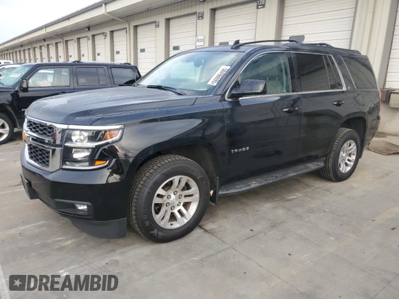 2019 Chevrolet Tahoe LT with VIN 1GNSKBKC2KR349527, listed as a Copart auction lot 58496695 with 128,590 mi miles and Salvage title. Bid and sale history available at DreamBid. Image 1.