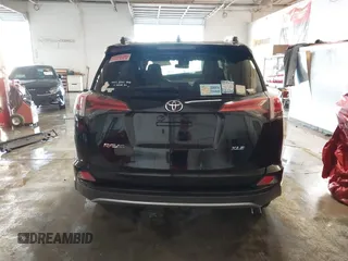 2018 Toyota RAV4 XLE with VIN 2T3WFREV1JW471931, listed as a IAAI auction lot 41332851 with 123,657 mi miles. Bid and sale history available at carsss.com. Image 17.