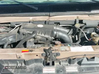 1993 Ford Econoline Cargo z VIN 1FDEE14H8PHA16631, wystawiony jako IAAI lot #43430343 z przebiegiem 124 444 mil mil oraz . Historia ofert i sprzedaży dostępna na DreamBid. Obrazek 12.