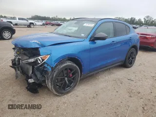 2019 Alfa Romeo Stelvio z VIN ZASPAJAN2K7C71803, wystawiony jako Copart lot #78796144 z przebiegiem 48 855 mil mil oraz Szkody całkowita. Historia ofert i sprzedaży dostępna na DreamBid. Obrazek 1.