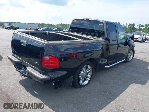 2000 Ford F-150 XL z VIN 2FTRX07L9YCA98355, wystawiony jako IAAI lot #42123587 z przebiegiem 191 000 mil mil oraz . Historia ofert i sprzedaży dostępna na DreamBid. Obrazek 4.