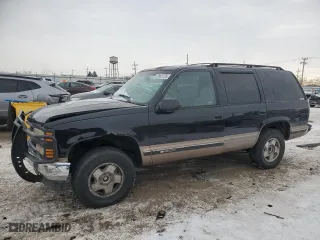 1996 Chevrolet Tahoe with VIN 1GNEK13R9TJ335411, listed as a Copart auction lot 87663725 with 111,802 mi miles and Salvage Title. Bid and sale history available at carsss.com. Image 1.