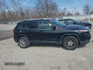 2015 Jeep Cherokee Latitude with VIN 1C4PJLCB3FW517843, listed as a IAAI auction lot 41828715 with 146,862 mi miles and . Bid and sale history available at DreamBid. Image 14.