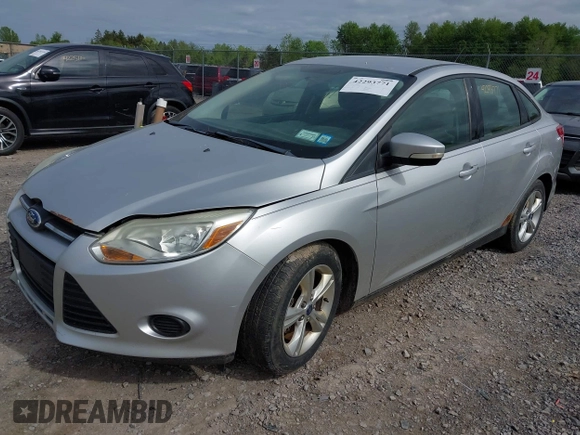 2013 Ford Focus SE с VIN 1FADP3F23DL348733, выставлен на аукционе IAAI как лот 42293771 с пробегом 112 886 миль миль и . История ставок и продаж доступна на DreamBid. Изображение 2.