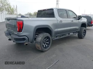 2021 GMC Sierra 1500 Elevation with VIN 3GTU9CED7MG289089, listed as a IAAI auction lot 41750582 with 63,351 mi miles and . Bid and sale history available at DreamBid. Image 4.