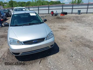 2007 Ford Focus S z VIN 1FAFP34N57W109953, wystawiony jako IAAI lot #42225399 z przebiegiem Nie podano mil oraz . Historia ofert i sprzedaży dostępna na DreamBid. Obrazek 12.