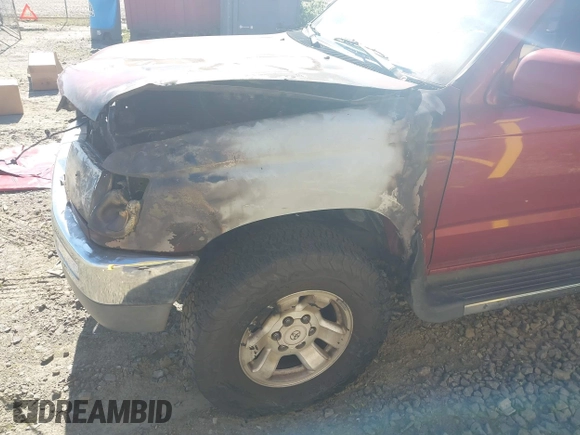1998 Toyota 4Runner SR5 z VIN JT3HN86RXW0193568, wystawiony jako IAAI lot #42062130 z przebiegiem Nie podano mil oraz . Historia ofert i sprzedaży dostępna na DreamBid. Obrazek 13.