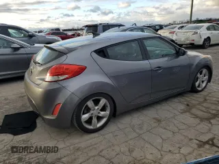 2014 Hyundai Veloster RE:FLEX z VIN KMHTC6AD2EU216453, wystawiony jako Copart lot #87090324 z przebiegiem 147 771 mil mil oraz Czysty tytuł • Clean title. Historia ofert i sprzedaży dostępna na DreamBid. Obrazek 3.