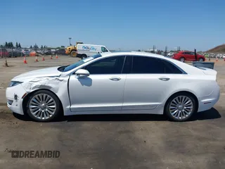 2013 Lincoln MKZ with VIN 3LN6L2JK2DR800880, listed as a IAAI auction lot 42407838 with 126,484 mi miles and . Bid and sale history available at DreamBid. Image 14.