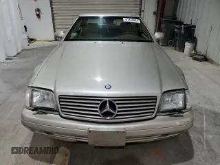 1999 Mercedes-Benz SL-Class with VIN WDBFA68F9XF172312, listed as a Copart auction lot 61248884 with 104,331 mi miles and Salvage Title. Bid and sale history available at carsss.com. Image 5.