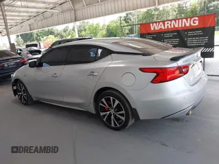 2018 Nissan Maxima SL with VIN 1N4AA6AP2JC385180, listed as a IAAI auction lot 42340264 with 115,736 mi miles and . Bid and sale history available at DreamBid. Image 14.