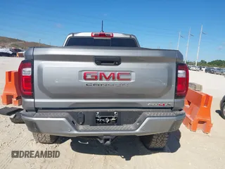 2024 GMC Canyon 4WD AT4X with VIN 1GTP6EEK6R1250127, listed as a IAAI auction lot 41823196 with 1,574 mi miles and . Bid and sale history available at carsss.com. Image 16.