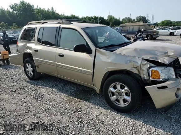 2004 GMC Envoy SLE z VIN 1GKET16S946198449, wystawiony jako Copart lot #58758375 z przebiegiem 102 946 mil mil oraz Szkoda całkowita • Salvage title. Historia ofert i sprzedaży dostępna na DreamBid. Obrazek 14.