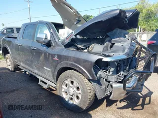 2020 Ram 2500 Laramie z VIN 3C6UR5NLXLG314141, wystawiony jako IAAI lot #42263978 z przebiegiem Nie podano mil oraz . Historia ofert i sprzedaży dostępna na DreamBid. Obrazek 1.