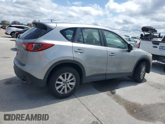 2014 Mazda CX-5 Sport with VIN JM3KE2BE1E0402185, listed as a Copart auction lot 52313675 with 140,398 mi miles and Salvage Title. Bid and sale history available at carsss.com. Image 3.