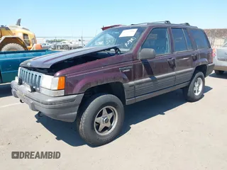 1994 Jeep Grand Cherokee Laredo with VIN 1J4GZ58Y8RC350719, listed as a IAAI auction lot 42757896 with 262,544 mi miles and . Bid and sale history available at DreamBid. Image 2.