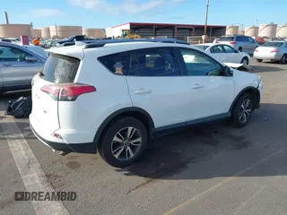 2018 Toyota RAV4 XLE with VIN JTMWFREV8JJ212450, listed as a IAAI auction lot 41425194 with 93,566 mi miles. Bid and sale history available at carsss.com. Image 4.