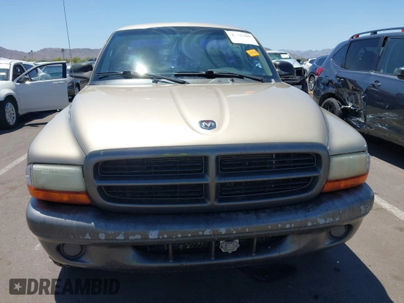 2002 Dodge Dakota with VIN 1B7FL16X72S642881, listed as a IAAI auction lot 42153560 with 220,917 mi miles and . Bid and sale history available at carsss.com. Image 12.