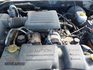 2003 Dodge Dakota SLT with VIN 1D7HL48N33S295059, listed as a IAAI auction lot 42085612 with 176,934 mi miles. Bid and sale history available at carsss.com. Image 10.
