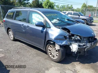 2015 Toyota Sienna XLE with VIN 5TDYK3DC0FS649998, listed as a IAAI auction lot 42531828 with 111,539 mi miles and . Bid and sale history available at DreamBid. Image 1.