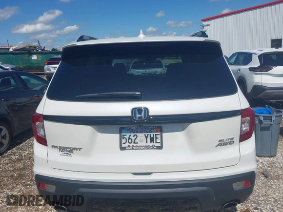 2019 Honda Passport Elite z VIN 5FNYF8H0XKB000774, wystawiony jako IAAI lot #42153669 z przebiegiem 65 415 mil mil oraz . Historia ofert i sprzedaży dostępna na DreamBid. Obrazek 16.
