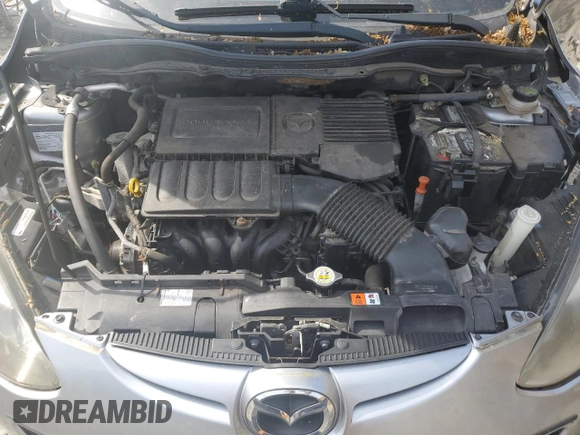2014 Mazda 2 Sport z VIN JM1DE1KZ5E0183858, wystawiony jako Copart lot #56530305 z przebiegiem 98 347 mil mil oraz Czysty tytuł • Clean title. Historia ofert i sprzedaży dostępna na DreamBid. Obrazek 11.