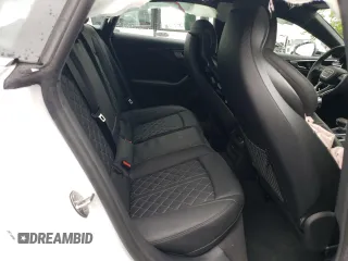 2024 Audi S5 Sportback Premium Plus z VIN WAUC4CF54RA036400, wystawiony jako Copart lot #56121475 z przebiegiem 7098 mil mil oraz Szkody całkowita. Historia ofert i sprzedaży dostępna na DreamBid. Obrazek 10.