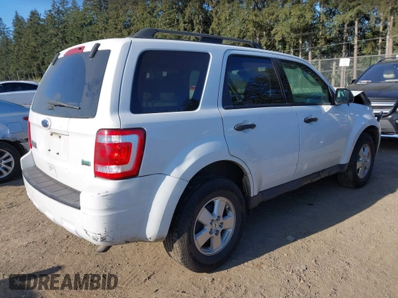 2012 Ford Escape XLT z VIN 1FMCU9DG9CKB92696, wystawiony jako IAAI lot #42065795 z przebiegiem 197 211 mil mil oraz . Historia ofert i sprzedaży dostępna na DreamBid. Obrazek 4.