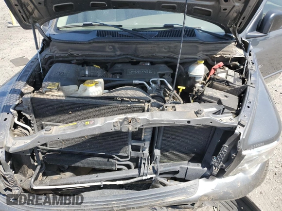 2005 Dodge 1500 SLT z VIN 1D7HU18D05S145030, wystawiony jako Copart lot #60825845 z przebiegiem 91 205 mil mil oraz Szkoda całkowita • Salvage title. Historia ofert i sprzedaży dostępna na DreamBid. Obrazek 11.