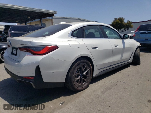 2023 BMW i4 eDrive35 with VIN WBY43AW07PFP64892, listed as a Copart auction lot 55696614 with 3,491 mi miles and Salvage Title. Bid and sale history available at carsss.com. Image 3.