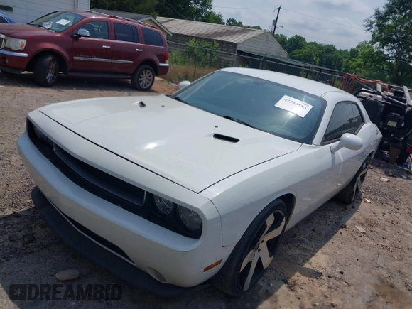 2012 Dodge Challenger SXT Plus z VIN 2C3CDYAG3CH168263, wystawiony jako IAAI lot #42283885 z przebiegiem 200 052 mil mil oraz . Historia ofert i sprzedaży dostępna na DreamBid. Obrazek 2.