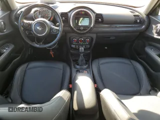 2019 MINI Clubman Cooper with VIN WMWLU1C59K2F29677, listed as a Copart auction lot 77201334 with 57,012 mi miles and Salvage Title. Bid and sale history available at carsss.com. Image 8.