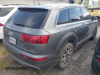 2017 Audi Q7 Premium with VIN WA1AAAF71HD010675, listed as a IAAI auction lot 41956959 with 136,549 mi miles and . Bid and sale history available at DreamBid. Image 4.