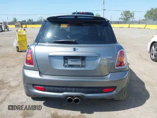 2007 MINI Hardtop S with VIN WMWMF73597TL86892, listed as a IAAI auction lot 42157544 with 93,097 mi miles and . Bid and sale history available at DreamBid. Image 17.