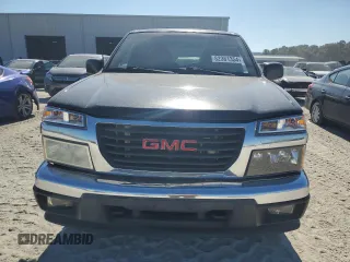 2010 GMC Canyon SLE1 with VIN 1GTJTCDE6A8113828, listed as a Copart auction lot 82361354 with 212,101 mi miles and Salvage Title. Bid and sale history available at carsss.com. Image 5.