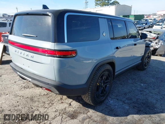 2024 Rivian R1S Adventure with VIN 7PDSGBBA8RN043516, listed as a IAAI auction lot 41675732 with 1 mi miles. Bid and sale history available at carsss.com. Image 4.