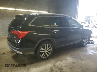 2017 Honda Pilot Touring z VIN 5FNYF6H91HB011030, wystawiony jako Copart lot #60236875 z przebiegiem 119 909 mil mil oraz Szkoda całkowita • Salvage title. Historia ofert i sprzedaży dostępna na DreamBid. Obrazek 3.