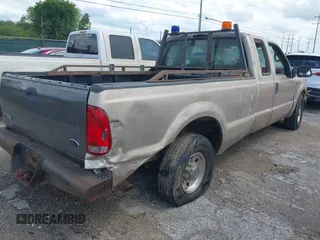 1999 Ford F-350 XL with VIN 1FTSX30F7XEC60385, listed as a IAAI auction lot 42493144 with 210,660 mi miles and . Bid and sale history available at DreamBid. Image 4.