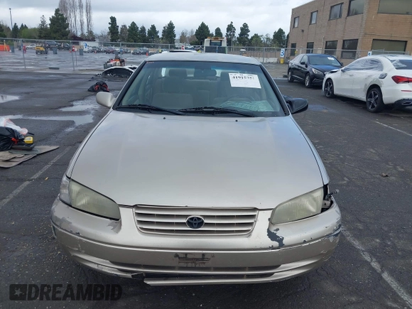 1997 Toyota Camry LE z VIN 4T1BF22K8VU916373, wystawiony jako IAAI lot #41915751 z przebiegiem 259 818 mil mil oraz . Historia ofert i sprzedaży dostępna na DreamBid. Obrazek 11.