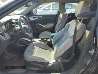 2013 Hyundai Veloster w/Black Int z VIN KMHTC6AD5DU173029, wystawiony jako Copart lot #52587455 z przebiegiem 161 716 mil mil oraz Czysty tytuł • Clean title. Historia ofert i sprzedaży dostępna na DreamBid. Obrazek 7.
