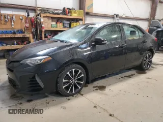 2019 Toyota Corolla L z VIN 2T1BURHE6KC152553, wystawiony jako Copart lot #61573735 z przebiegiem 102 006 mil mil oraz Szkoda całkowita • Salvage title. Historia ofert i sprzedaży dostępna na DreamBid. Obrazek 1.