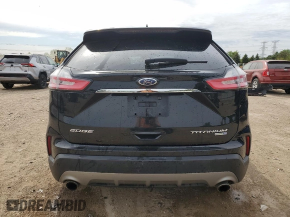 2019 Ford Edge Titanium with VIN 2FMPK4K93KBB42822, listed as a Copart auction lot 57308545 with 102,252 mi miles and Salvage title. Bid and sale history available at DreamBid. Image 6.