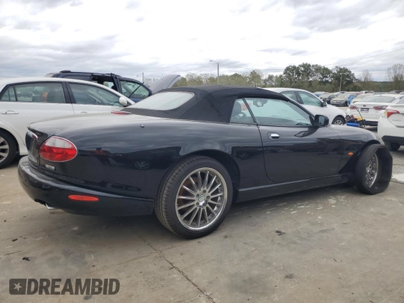 2006 Jaguar XK with VIN SAJDA42C462A44968, listed as a Copart auction lot 75758524 with 77,266 mi miles and Salvage Title. Bid and sale history available at carsss.com. Image 3.