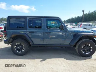 2024 Jeep Wrangler Rubicon X z VIN 1C4RJXR6XRW240316, wystawiony jako IAAI lot #42477607 z przebiegiem 41 375 mil mil oraz . Historia ofert i sprzedaży dostępna na DreamBid. Obrazek 13.
