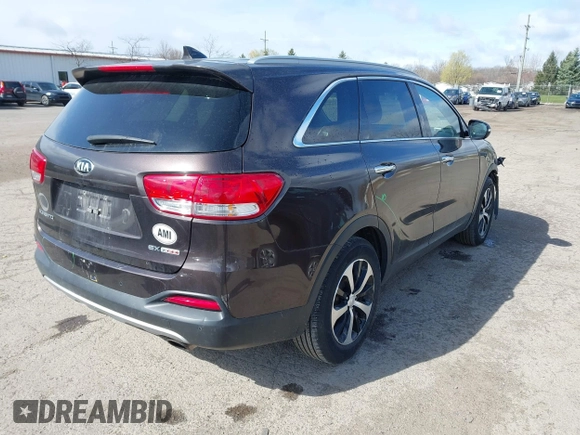 2016 Kia Sorento EX with VIN 5XYPHDA18GG039543, listed as a IAAI auction lot 42016459 with 64,121 mi miles and . Bid and sale history available at DreamBid. Image 4.