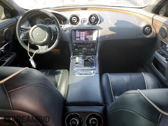 2013 Jaguar XJ Supercharged with VIN SAJWA2GE3DMV42875, listed as a Copart auction lot 71409324 with 129,422 mi miles and Salvage title. Bid and sale history available at DreamBid. Image 8.