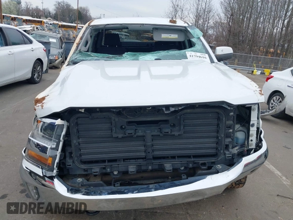 2018 Chevrolet Silverado 1500 LT with VIN 1GCUKREC0JF208509, listed as a IAAI auction lot 41794616 with 96,962 mi miles and . Bid and sale history available at DreamBid. Image 6.