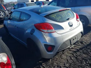 2016 Hyundai Veloster Turbo with VIN KMHTC6AE7GU264753, listed as a IAAI auction lot 41699222 with 999,999 mi miles. Bid and sale history available at carsss.com. Image 3.