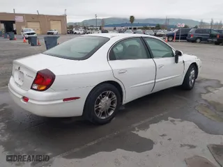 2001 Oldsmobile Aurora with VIN 1G3GS64C114109142, listed as a IAAI auction lot 41974652 with 81,395 mi miles. Bid and sale history available at carsss.com. Image 4.