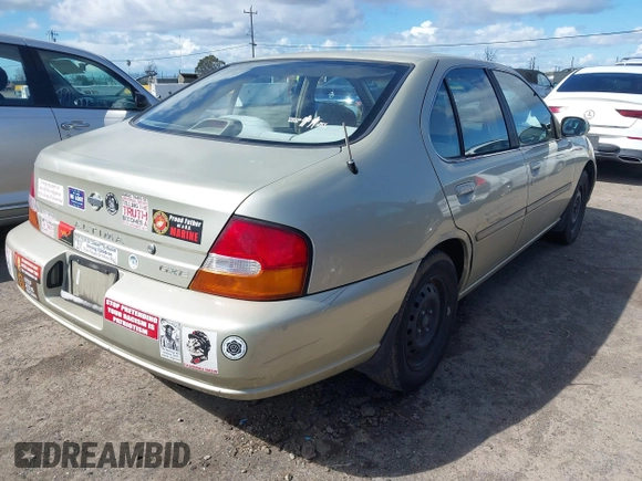 1999 Nissan Altima XE with VIN 1N4DL01D6XC179556, listed as a IAAI auction lot 41783234 with 129,064 mi miles. Bid and sale history available at carsss.com. Image 4.